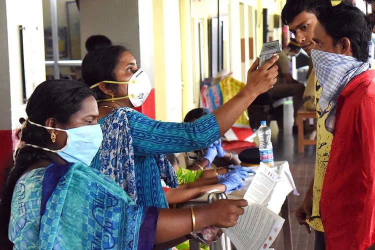 | Medical officers measure body temperature of passengers at a railway station in Kochi state of Kerala on March 16 | MR Online