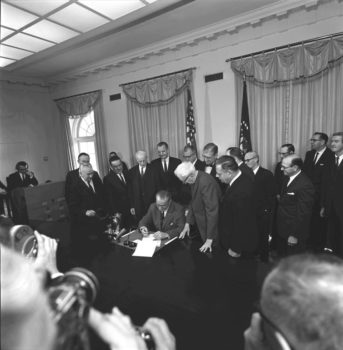 | President Lyndon Johnson signs the 24th Amendment Feb 4 1964 abolishing poll taxes Cecil W StoughtonWikimedia Commons | MR Online