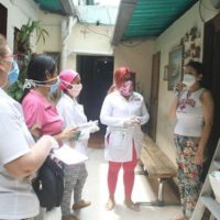 Venezuelan doctors conducting a COVID-19 house visit. Photo courtesy of @OrlenysOV