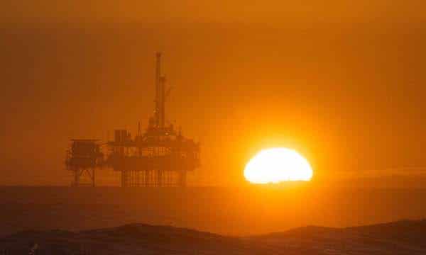 | Offshore oil rig with sunset | MR Online