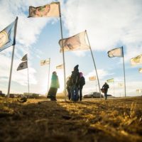 Flags fly at the Oceti Sakowin Camp in 2016, near Cannonball, North Dakota. LUCAS ZHAO / CC BY-NC 2.0