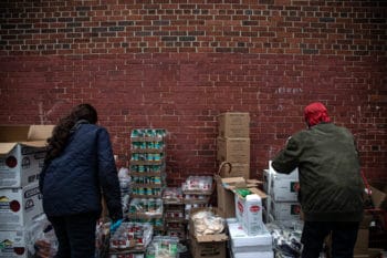 | Volunteers prepare donations at a community outreach in Brooklyn New York March 20 2020 OWong Maye E | AP | MR Online