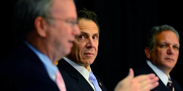 | New York Gov Andrew Cuomo looks on as Google executive chair Eric Schmidt left talks during the Smart Schools Commission report at Mineola Middle School on Oct 27 2014 in Mineola NY Photo Alejandra Villa PoolGetty Images | MR Online