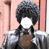 Title: Phil Lynott in a time of pandemic Caption: Statue of Thin Lizzy frontman Phil Lynott in Dublin city centre, during the coronavirus pandemic. Photo: Eamonn Farrell.