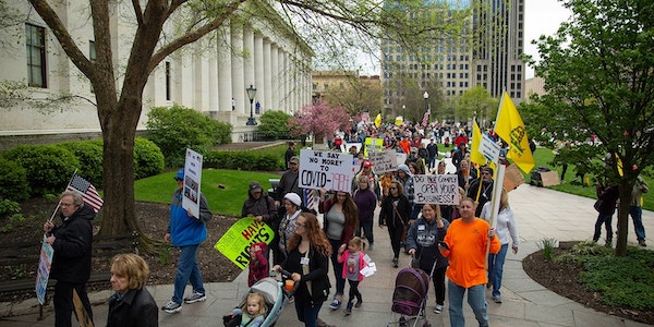 | Demonstrators protest outside the Ohio statehouse in opposition of Gov Mike DeWines stay at home order in Columbus Ohio on May 1 2020 Photo Anadolu AgencyGetty Images | MR Online