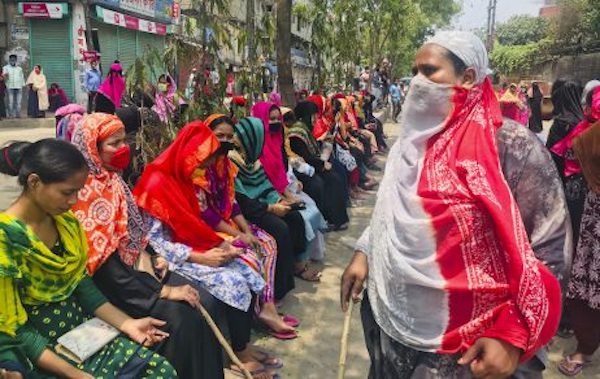 | Bangladeshi garment workers block a road demanding their unpaid wages during a protest in Dhaka Bangladesh April 16 2020 Credit AP PhotoAl emrun Garjon | MR Online