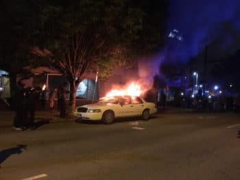 | A police car burning in front of the police station in Richmond Virginia on the evening of May 29 | MR Online