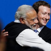 Facebook CEO Mark Zuckerberg, right, hugs Prime Minister of India Narendra Modi at Facebook in Menlo Park, Calif. Jeff Chiu | AP