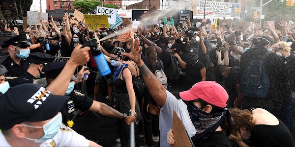 | NYPD officers spray Mace into the crowd of protesters gathered at Barclays Center to protest the recent murder of George Floyd on May 29 2020 in Brooklyn New York Photo Kevin MazurGetty Images | MR Online