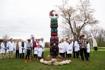 | Freddie Lane of the Lummi Nation leads a totem pole blessing ceremony at the opening of Kwel Hoy Many Struggles One Front an exhibition by the House of Tears Carvers of the Lummi Nation and The Natural History Museum at The Watershed Center a science education and advocacy center outside of Princeton New Jersey in 2018 Connecting the science communitys efforts to protect the local watershed from the proposed PennEast Pipeline to the nearby Ramapough Lenape Nations struggle to stop the Pilgrim Pipeline and the Lummis struggles to protect the waters of the Pacific Northwest from oil tankers and pipelines the exhibition was one stop of a cross country tour an evolving museum exhibition and series of public programs uplifting efforts to protect water land and our collective future Photo Emmanuel Abreu courtesy of Not An AlternativeThe Natural History Museum | MR Online