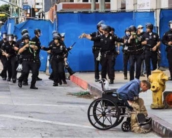 | LAPD officers attack homeless man Charf Lloyd with projectiles in a photo taken and posted to Facebook by Kirk Tsonos | MR Online