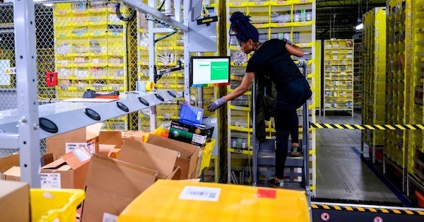 | An Amazon employee works in the companys warehouse on Staten Island Photo Johannes Eisele AFP via Getty Images | MR Online