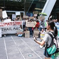 Nanticha “Lynn” Ocharoenchai before the crowd at Climate Strike Thailand event in May. Photo: Nanticha “Lynn” Ocharoenchai / Courtesy