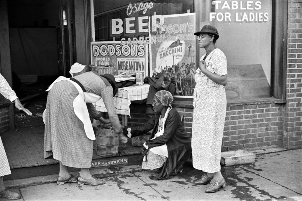 | Coal miners wives making ice cream to sell on Saturday afternoon after payday Osage West Virginia 1938 Photo by Marion Post WolcottFarm Security Administration Office of War Information Photograph Collection Library of Congress | MR Online