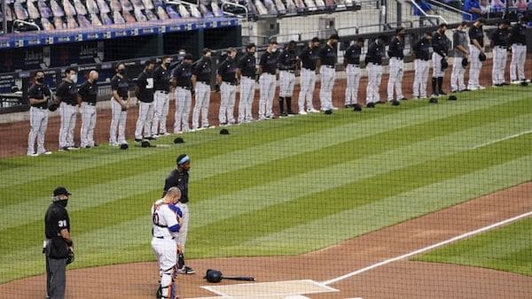 | The New York Mets and Miami Marlins stand on the field and bow their heads before a scheduled baseball game before walking off in protest Thursday Aug 27 2020 in New York AP PhotoJohn Minchillo | MR Online