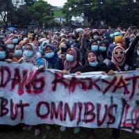 Thousands of Indonesians have taken the streets of Jakarta, Bandung and other cities in protest against the government’s push to enact the “omnibus law”.