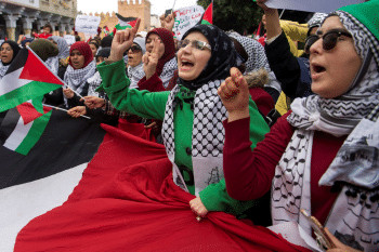 | Pro Palestinian protesters wave Palestinian flags and chant slogans against the US and Israel in Rabat on 10 December 2017 AFP | MR Online