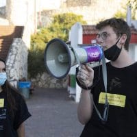 Conscientious objectors Shahar Peretz (left) and Daniel Peldi at an anti-annexation protest in the city of Rosh Ha’ayin June 2020. (Oren Ziv)