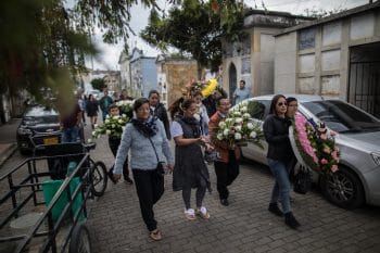 | Relatives of Astrid Conde a former FARC rebel at her funeral in Bogota after she was gunned down near her home March 8 2020 Ivan Valenciaa | AP | MR Online