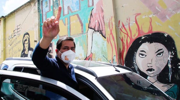 | Andres Arauz the presidential candidate for the political coalition National Union for Hope UNES flashes a number one finger sign as he leaves a press conference in Quito Ecuador Jan 13 2021 Dolores Ochoa | AP | MR Online
