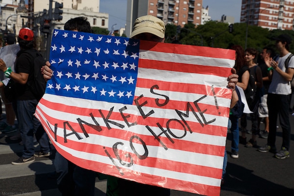 | A protester carries a sign reading Yankees go home during a rally protesting the 2018 G20 summit in Buenos Aires Argentina Montecruz Foto | MR Online