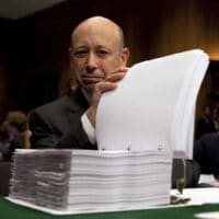 | Goldman Sachs Chairman and CEO Lloyd Blankfein examines a report on his company by the Senate Permanent Subcommittee on Investigations before a 2010 hearing on Wall Street investment banks and the financial crisis AP | MR Online