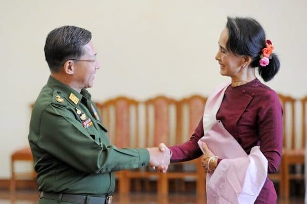 | In this file photo dated Dec 2 2015 Myanmar military chief General Min Aung Hlaing L and National League for Democracy party leader Aung San Suu Kyi R shake hands after their meeting at the Commander in Chiefs office in Naypyidaw | MR Online