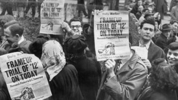 | Demonstrators hold up copies of the Daily Worker predecessor of Peoples World outside the Federal Courthouse in New York during the frame up trial of Communist Party leaders | Peoples World Archives | MR Online