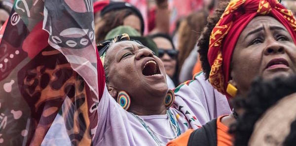 | Activists at the National Black Womens March Against Racism Violence and for Well Being in Brazil | MR Online