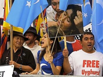 | Uwyghur People Demand Freedom with Flag of East Turkestan in front of the UN Building in NYC | MR Online