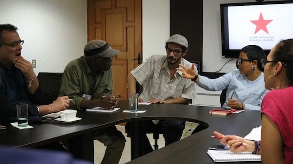 | From left to right Vijay Prashad Fred Mmembe Diego Sequera and Erika Farías in Caracas 2019 Photograph taken by Yeimi Salinas | MR Online
