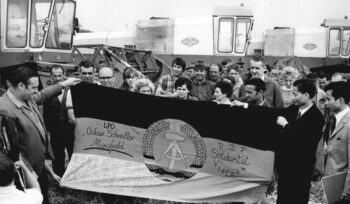 | This image from 1972 shows cooperative farmers handing over a flag of solidarity to the ambassador of the Democratic Republic of Vietnam Solidarity hastens victory was the motto under which the citizens of the DDR expressed their solidarity with the Vietnamese people and against the United States criminal war Enthusiasm to donate for the cause of the Vietnamese was extraordinary by 1975 more than 442 million East German Mark had been collected The victory of the North Vietnamese troops on 1 May 1975 was celebrated in the streets of Berlin singing Everybody on the street May is red everybody on the street Saigon is free | MR Online