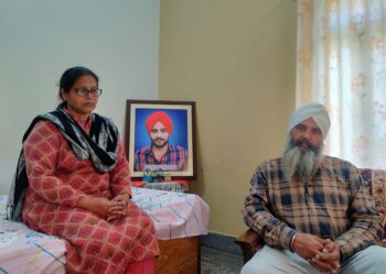 | The death of their son Navreet Singh in the framed photo has left a void in Paramjeet Kaur left and Sirvikramjeet Singh Hundals lives | MR Online