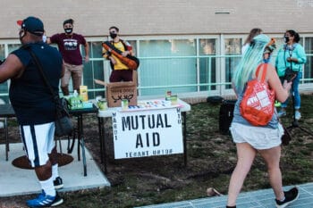 | A DC Ward 1 Mutual Aid table set up at a Cancel Rent rally to support tenants Eleanor Goldfield | ArtKillingApathycom | MR Online