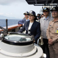 Taiwan President Tsai Ing-wen (second from left) inspects a naval destroyer during miliotary drills off the port of Su’ao ahead of planned war games by China. Photo | Military News Agency via AP