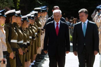 | Israels Shimon Peres left and Colombias Juan Santos smile at Israeli soldiers durizzng a ceremony in Jerusalem June 10 2013 Sebastian Scheiner | AP | MR Online