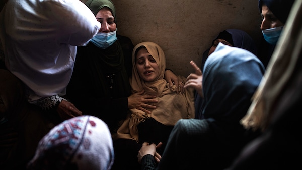 | Relatives of 11 year old Hussain Hamad who was killed by an Israeli airstrike mourn during his funeral in the family home in Beit Hanoun northern Gaza Strip May 11 2021 Khalil Hamra | AP | MR Online