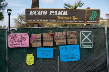| The fence surrounding Echo Park Lake is decorated with signs on April 24 2021 Photo credit Jeremy Lindenfeld WhoWhatWhy | MR Online
