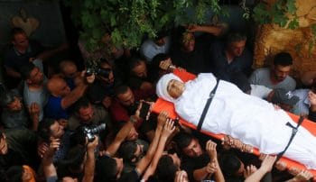 | MOURNERS CARRY THE BODY OF PALESTINIAN TEENAGER AHMED ZAHI BANI SHAMSA WHO DIED OF WOUNDS SUSTAINED AT THE HANDS OF ISRAELI FORCES DURING CLASHES IN THE VILLAGE OF BEITA SOUTH OF IN THE WEST BANK OF NABLUS ON JUNE 17 2021 PHOTO BY SHADI JARARAH C APA IMAGES | MR Online