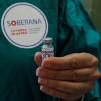 A nurse shows a dose of the Soberana-02 COVID-19 vaccine to be used in a volunteer as part of Phase III trials of the experimental Cuban vaccine candidate in Havana, Cuba, March 31, 2021