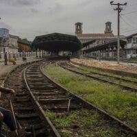 A worker takes a breaks on the tracks of the Central Railway Station, in Havana, Cuba