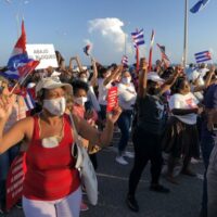 Cubans take part in a mass rally in defence of the Cuban Revolution and calling for an end to U.S. sanctions, July 2021.