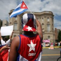 Cuban supporter waves a Cuban flag