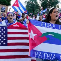 Floridians from Cuba’s ex-pat community in Hialeah, Fla. protest