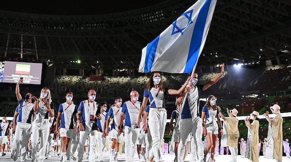 | FLAG BEARERS HANNA MINENKO AND YAKOV TOUMARKIN OF TEAM ISRAEL DURING THE OPENING CEREMONY OF THE TOKYO 2020 OLYMPIC GAMES JULY 23 2021 | MR Online