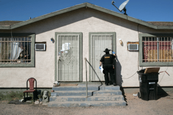 | Maricopa County Constable Darlene Martinez knocks on a door before posting an eviction order on Oct 1 2020 in Phoenix Photo John MooreGetty Images | MR Online