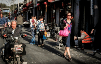 | Chao Xiaomi walks down a street in Beijing | MR Online