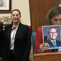 Far-right Florida Congresswoman María Elvira Salazar holding up photos of US-funded coup leaders Felix Maradiaga and Arturo Cruz at a hearing on Nicaragua