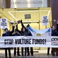 Debt campaigners protest the impact of "vulture funds" on Argentina outside the office of Elliott Advisors, owners of NML Capital, in New York in February 2013.