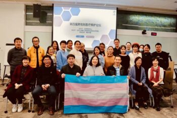 | Pan third from the right poses for a group photo during a forum on healthcare for transgender people in China November 2021 Courtesy of Beijing Youth Daily | MR Online